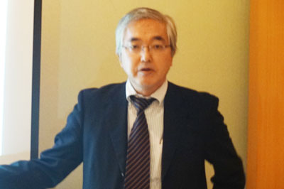 Vice President Fukuda delivering the briefing