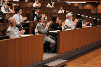 Judges and guests listening seriously and avidly to the confident speeches