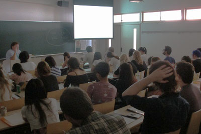 Prof. Field (Director of ESOP) explaining university life