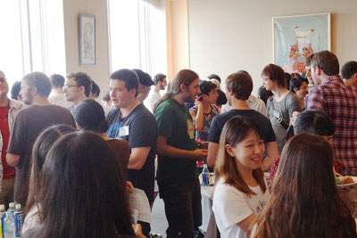 Many students gathering at the welcome party
